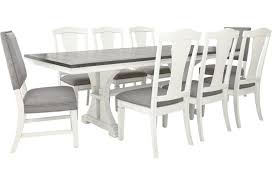 Wood dining room table sets are hefty and durable, however, ensure that your tabletop is sealed so moisture and liquid does not damage the precious wood. Ashley Furniture Benchcraft Nashbryn Transitional 9 Piece Dining Set With Upholstered Chairs Del Sol Furniture Dining 7 Or More Piece Sets