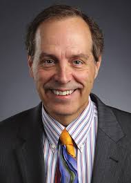 Researchers study red-headed woodpeckers to solve mysteries of charismatic,  declining species