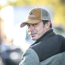 Mark Still, green helmet, and...