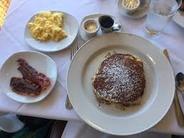 Hearty Pancakes Bacon And Scrambled Eggs Picture Of