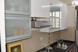 The upper area shelves are long with an opening at the bottom, and the place is left at the centre for a chimney. Useful Tips Before Installing Modular Kitchen Civillane