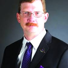 Brown introduces new director