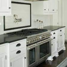Recent kitchen backsplash ideas show personality, mood, and unique design features. Kitchens Pencil Tile Border Design Ideas