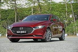 The mazda seems like better value and it is feature packed, but i'm not sure about the diesel engine. 2019 Mazda 3 1 5 Elegance Review Elegant Solution Carbuyer Singapore