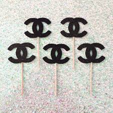 Introduced in november, but only just arrived in uk stores. Chanel Cupcake Toppers Cupcake Toppers Chanel Party By Citygirlcollection On Etsy Https W Coco Chanel Birthday Party Chanel Party Chanel Birthday Party
