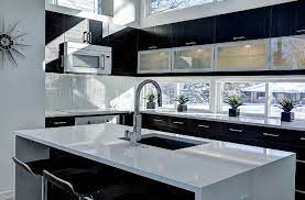 The combination of green tiles with the boards and windows look great for a backsplash. A Fresh Perspective Window Backsplash Ideas And The Designs Around Them Kitchen Window Design Interior Design Kitchen Modern Kitchen Cabinets