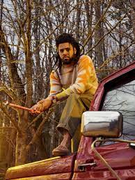 The cover art depicts cole as a king with a bunch of children doing drugs under his robe. J Cole Profile Buck The System Gq