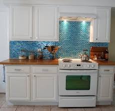Kitchen Turquoise Backsplash Butcher Block Counters White Cabinets White Appliances Turquoise Kitchen Kitchen Remodel Before And After Kitchen Remodel