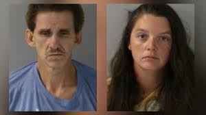 Two arrested after passing out with drugs in car and kids in back seat,  police say