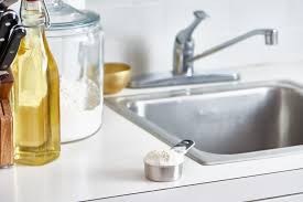 a stainless steel sink with flour