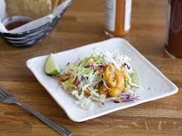 Fish is battered in beer and served with lime mayo, morita salsa, cilantro, and a healthy portion of julienned radishes. 17 Best Fish Tacos In Los Angeles For Pescado Perfection