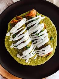 Hosts bridget lancaster and julia collin davison unlock the secrets to making a mexican staple: Roasted Chicken Poblano Enchiladas Thecommunalfeast Com
