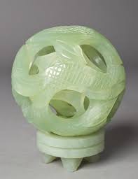 Called chinese puzzle balls, mystery balls, or generation balls, they are hard to find any info about on the net. A Chinese Serpentine Jade Puzzle Ball On Stand