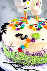So this cake was made to celebrate my grandparents and my dad, all of whom have passed. Dia De Los Muertos Cake Lemon Blossoms