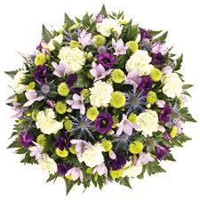 The uk is home to an abundance of wildflowers that come in all shapes and sizes, which you'll find dotted across parkland, moorland, forests, and the pretty powder blue flowers of the campanula rotundifolia are admired by many. Blue And Lime Funeral Flowers In Posy Arrangement Delivered In The Uk