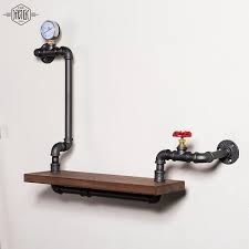 Pipe shelves can be used in homes, stores, or office spaces to hold different items. Bathroom Wall Hanging Corner Shelf Apollobox