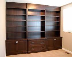 Make the necessity of home office storage into something beautiful with a feature wall of shelving or pinned pictures. Pin On Built In Office