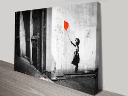 Arguably the most controversial street artist in the world, vandal and political activist, banksy has advanced an entire art subculture over his 20 years of being involved within the graffiti scene, all this whilst remaining anonymous. Banksy Balloon Girl There Is Always Hope Stretched Canvas Prints Online