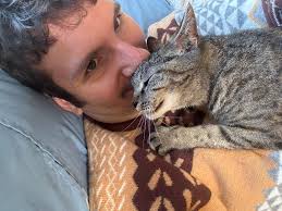 Does anybody knows why my kitty Olivia touches the water before she drinks  it? 🤔😹😹 BTW that's a photo of her with me