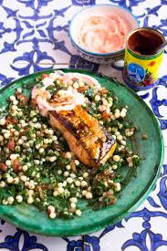 Many mediterranean dishes get their inspiration from the sea but middle eastern food typically does not. Harissa Roasted Salmon Middle Eastern Recipes John Gregory Smith