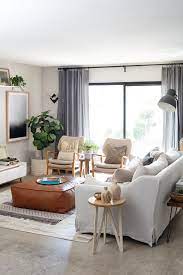 One sofa, three tables, and four chairs. 20 Living Room Furniture Arrangement Ideas For Any Size Space Better Homes Gardens