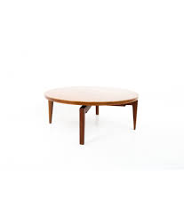 No cracks or splits in wood. Jens Risom Mid Century Round Lazy Susan Coffee Table