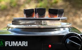 The secret to a great fire is to create a small combustion chamber that your fire can take hold of, and quickly grow to a high temperature. How To Light Your Hookah Coals Fumari Hookah Blog