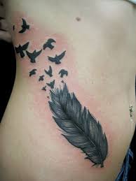 Flying Bird Tattoo On Ribs Getting Feather Tattoos On Ribs Small Bird Tattoos Rib Tattoo Ribcage Tattoo