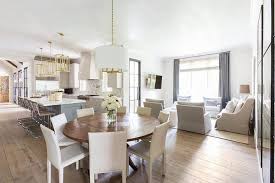 Browse a wide selection of chandelier lighting, including modern chandeliers, crystal chandeliers and chandelier fixture ideas kitchen & table linens. Round Wood Dining Table With Sleek Light Gray Leather Dining Chairs Transitional Dining Room