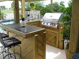Keter pacific cool bar outdoor patio furniture and hot tub side table with 7.5 gallon beer and portable charcoal grill with lid folding tabletop bbq grill barbecue grill for outdoor cooking. Decks And Docks Home Remodeling And More Outdoor Patio Bar Outdoor Kitchen Design Bbq Bar