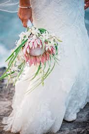 Beach Bride Wedding Bouquet King Protea Palm Fronds White Flowers Mariah Milan Beach Wedding Flowers Wedding Bouquets Bride Protea Bouquet