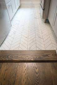 Don T You Love How Perfectly Paired These Floorings Are Together White Porcelain Chevron Tile Floor From Kitchen Remodel Plans Flooring Chevron Tiles Floor