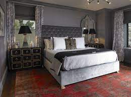 A simple framed bird soaring through the sky is placed above the headboard along with unique vases to convey a modern aesthetic with clean lines. Pin On Gorgeous Interiors Architecture