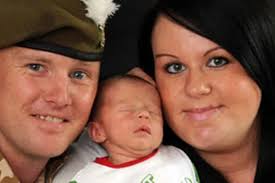 Soldier finally meets newborn son after 4,000 mile journey from Afghanistan 
