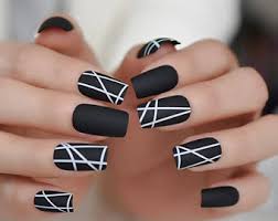 So, they coat the nails with hard and durable layer and function to beautify your extended nails and strengthen the nail add a flower with a big yellow and white stone in the middle to finish the look. Matte White Nails Etsy