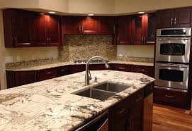 Natural maple stain with a furniture quality satin finish. Cherry Double Shaker Kitchen Cabinets Custom Cabinets Stone International