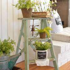 Fiberglass and aluminum have become but if you're a diy sort of person or enjoy indoor gardening, having a step ladder is a good idea. 11 Ways To Decorate With Vintage Ladders