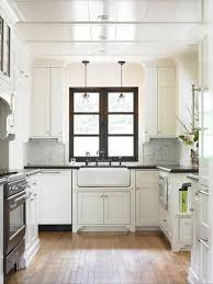 Thefoodogatemyhomework A Contemporary Take On Country Style In This Transitional Kitchen Love The Dark Walnut Cou With Images Small White Kitchens White Farmhouse Sink