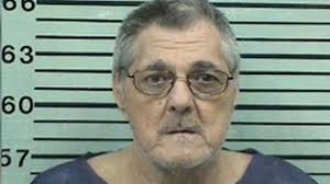 Texas man, 72, caught shoving suffocated wife into his car