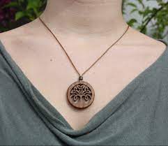 Maybe you would like to learn more about one of these? Irish Elm Celtic Tree Of Life Necklace