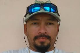 Motorcyclist killed in after-curfew hit-and-run.