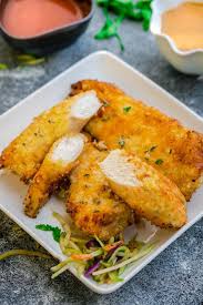 Oven Fried Coconut Chicken Tenders Tender Chicken Breaded In A Delicious Coconut Panko Mixt Fries In The Oven Easy Chicken Recipes Oven Fried Chicken Tenders