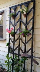 Whether the design is wood or metal, a garden trellis creates a beautiful backdrop for outdoor living spaces. 21 Diy Arbor And Trellis Ideas For Your Garden The Handyman S Daughter