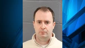 Baby stabbed in neck, father charged with murder