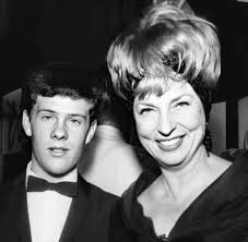 Sixty-one years ago tonight (8/27/64) Agnes Moorehead attended the premiere  of Walt Disney's "Mary Poppins." The young man by Aggie is her foster son  Sean. Sean and Aggie had a tumultuous relationship