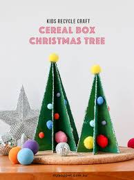 Putting together a journal from an empty box of cereal that was just going to go to recycling anyway is just too easy and too cute to not make a bunch of them for. Kids Recycle Craft Cereal Box Christmas Tree My Poppet Makes