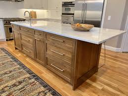 For slab doors, you will want the hole placement to be equidistant from the bottom and side of the cabinet. How To Choose Hardware Pull Size For Your Cabinets
