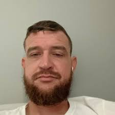 What could cause a BMW driver side to pop going over bumps after replacing  control arms and tie rods?