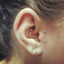 This Is My Ear Sideburn Dermals And A Daith Heart Done By My Brother I Love It Piercings For Girls Unique Ear Piercings Kylie Jenner Ear Piercings