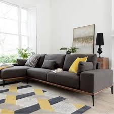 Comfort and style abound in this sofa, featuring rolled arms with nailhead trim and large back pillows for comfort. L Shaped Couch Design Ideas Home Decoration Trends Corner Sofa Living Room Dark Grey Sofa Living Room Grey Sofa Living Room